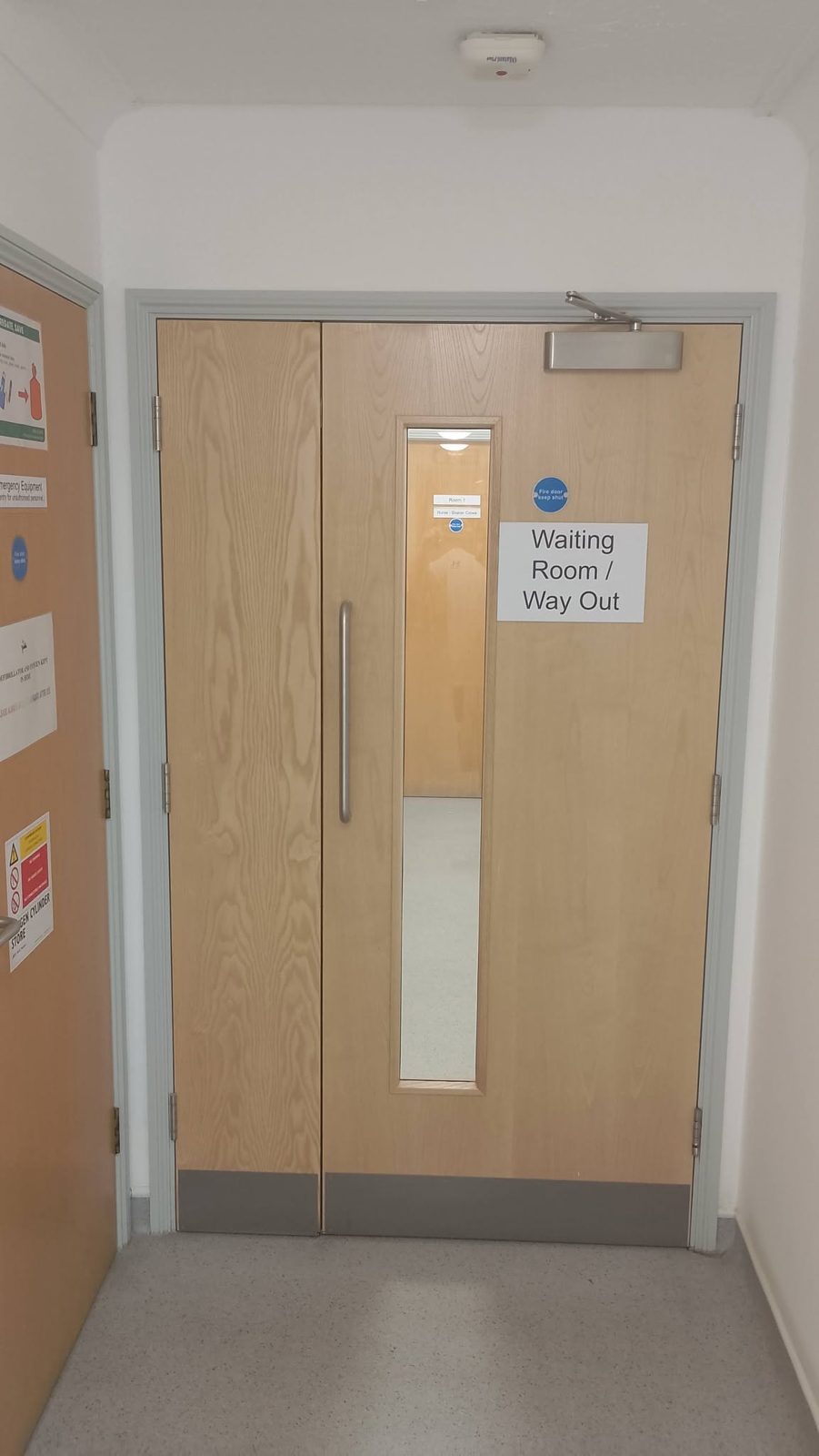 Surgery double doors with freshly painted frames and walls